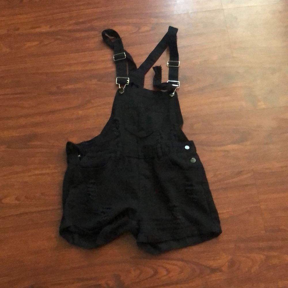 Distressed overalls.